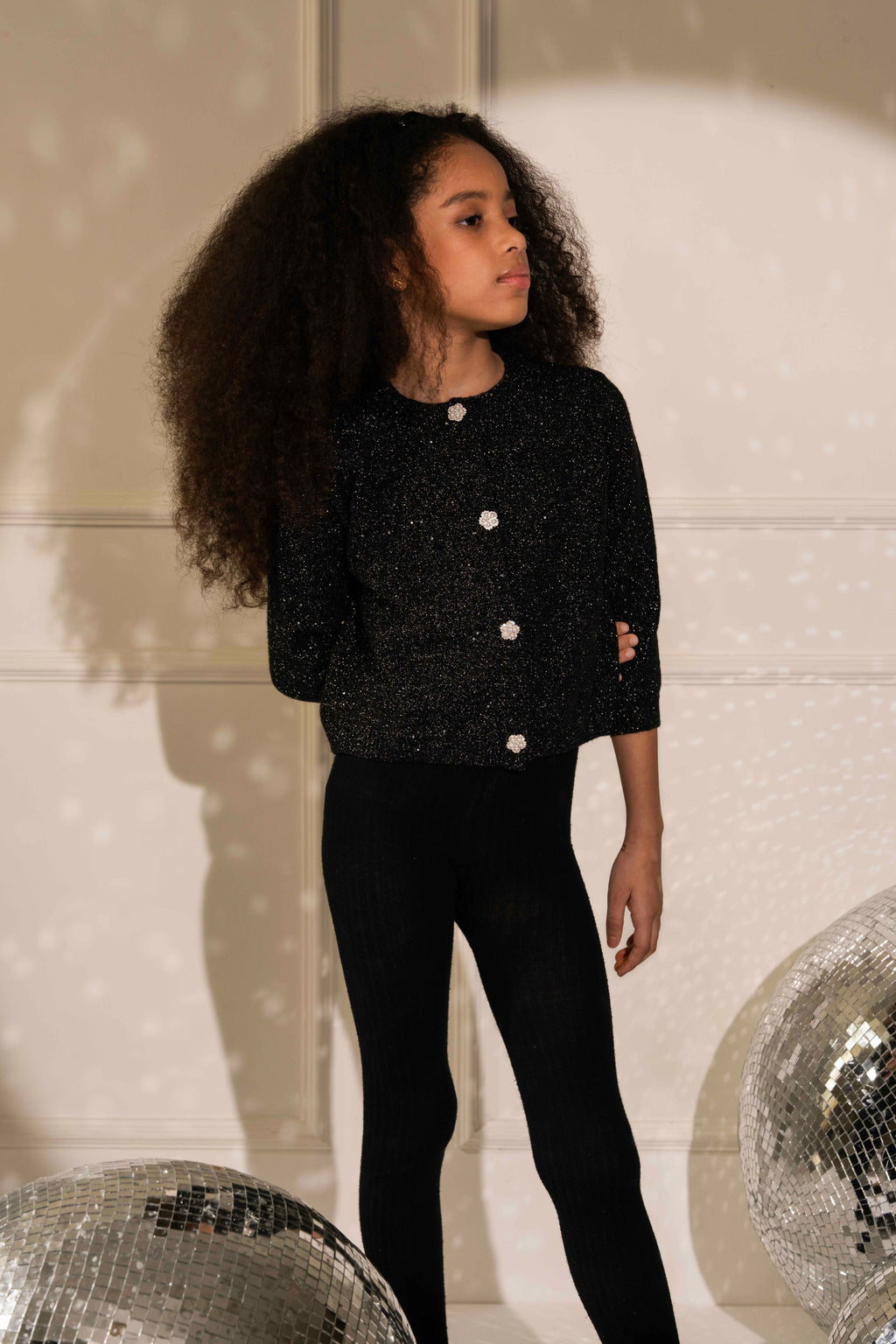 Lady in Black Cardigan by Nino Atelier