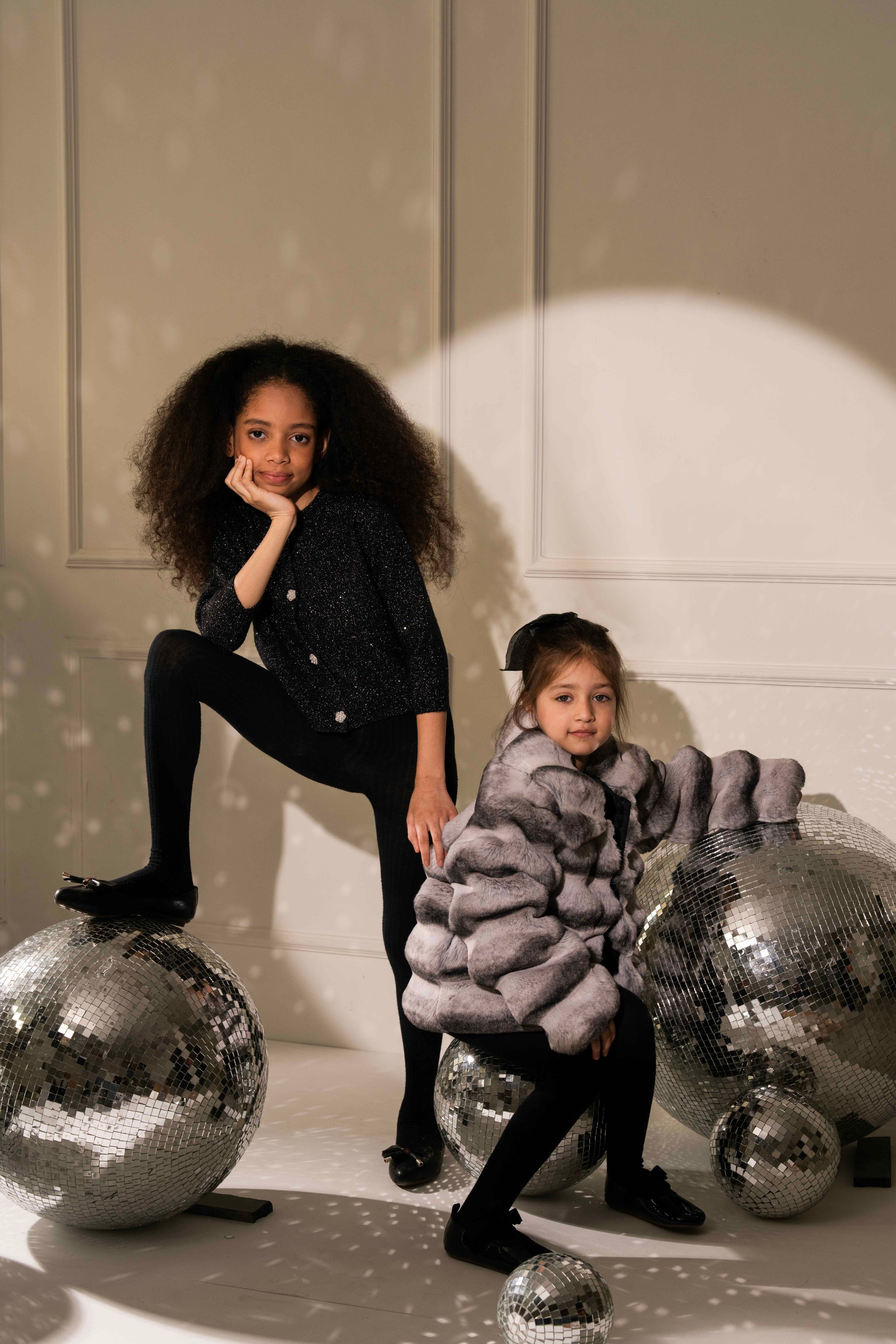 Lady in Black Cardigan by Nino Atelier